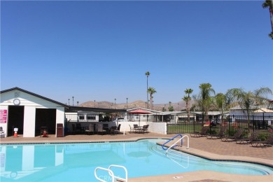 Beautifully updated and move-in ready, this 2-bedroom, 2-bath on Colonial Country Club in California - for sale on GolfHomes.com, golf home, golf lot