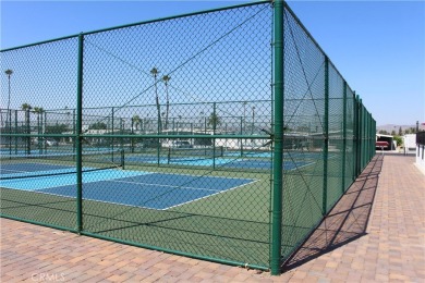 Beautifully updated and move-in ready, this 2-bedroom, 2-bath on Colonial Country Club in California - for sale on GolfHomes.com, golf home, golf lot