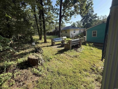 Welcome to 403 Pavilion Ln in Horseshoe Bend--your peaceful on The Course At Turkey Mountain in Arkansas - for sale on GolfHomes.com, golf home, golf lot