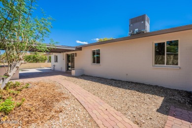 This move-in ready home features fresh paint inside & out and on Bellaire Golf Club in Arizona - for sale on GolfHomes.com, golf home, golf lot