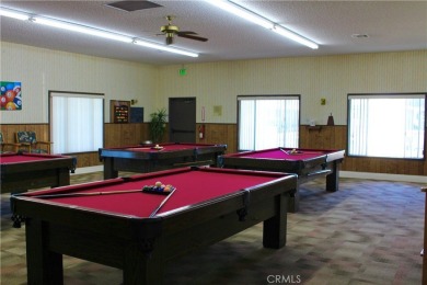 Beautifully updated and move-in ready, this 2-bedroom, 2-bath on Colonial Country Club in California - for sale on GolfHomes.com, golf home, golf lot
