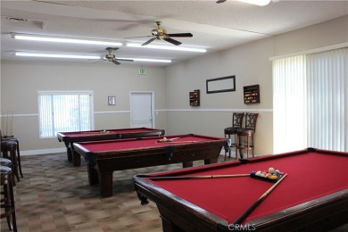 Beautifully updated and move-in ready, this 2-bedroom, 2-bath on Colonial Country Club in California - for sale on GolfHomes.com, golf home, golf lot