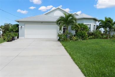 This charming courtyard pool home is more than just a house; on Rotonda Golf and Country Club The Palms Course in Florida - for sale on GolfHomes.com, golf home, golf lot