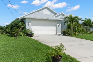 This charming courtyard pool home is more than just a house; on Rotonda Golf and Country Club The Palms Course in Florida - for sale on GolfHomes.com, golf home, golf lot