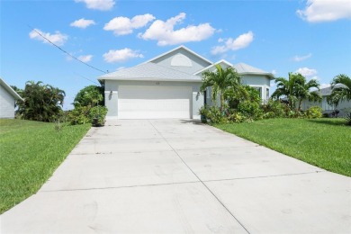 This charming courtyard pool home is more than just a house; on Rotonda Golf and Country Club The Palms Course in Florida - for sale on GolfHomes.com, golf home, golf lot