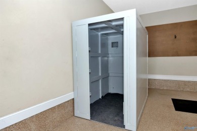 **STORM SHELTER** Situated on large CORNER LOT on 2nd Fairway of on Canebrake Golf Club in Alabama - for sale on GolfHomes.com, golf home, golf lot