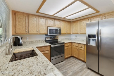 Welcome to this well-maintained home in the highly sought-after on Fountain of the Sun Country Club in Arizona - for sale on GolfHomes.com, golf home, golf lot