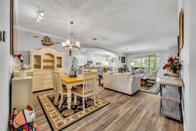 Located in the premier 55+ golf community of Arlington Ridge on Arlington Ridge Golf Club in Florida - for sale on GolfHomes.com, golf home, golf lot