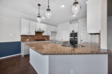 Welcome to this great home that backs up to the 14th hole on the on The Golf Club At Champions Circle in Texas - for sale on GolfHomes.com, golf home, golf lot