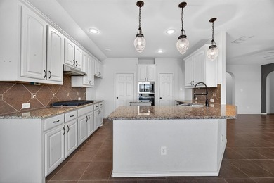 Welcome to this great home that backs up to the 14th hole on the on The Golf Club At Champions Circle in Texas - for sale on GolfHomes.com, golf home, golf lot