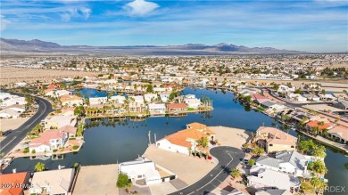 Rare 58-foot-wide waterfront lot on the middle lake in the on Los Lagos Golf Club in Arizona - for sale on GolfHomes.com, golf home, golf lot