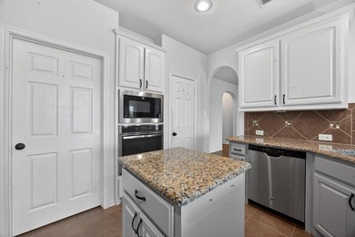 Welcome to this great home that backs up to the 14th hole on the on The Golf Club At Champions Circle in Texas - for sale on GolfHomes.com, golf home, golf lot