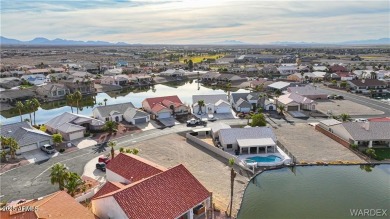 Rare 58-foot-wide waterfront lot on the middle lake in the on Los Lagos Golf Club in Arizona - for sale on GolfHomes.com, golf home, golf lot