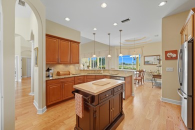 Discover refined living in this 3-bedroom, 3-bath home with a on Marsh Valley Country Club in Florida - for sale on GolfHomes.com, golf home, golf lot