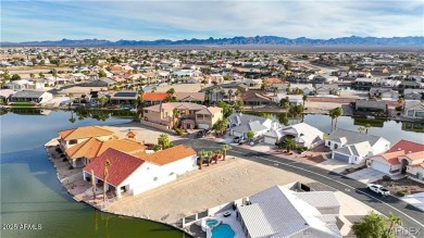 Rare 58-foot-wide waterfront lot on the middle lake in the on Los Lagos Golf Club in Arizona - for sale on GolfHomes.com, golf home, golf lot