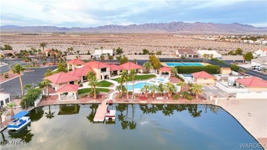 Rare 58-foot-wide waterfront lot on the middle lake in the on Los Lagos Golf Club in Arizona - for sale on GolfHomes.com, golf home, golf lot