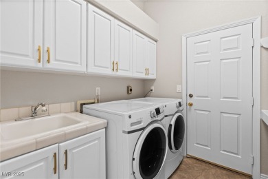 Live the comfortable lifestyle in this beautifully upgraded on Painted Desert Golf Club in Nevada - for sale on GolfHomes.com, golf home, golf lot