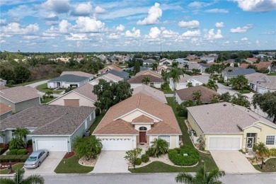 LIVE LIKE YOU'RE ON VACATION IN THE GATED COMMUNITY OF KINGS on Kings Gate Golf Club in Florida - for sale on GolfHomes.com, golf home, golf lot