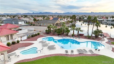 Rare 58-foot-wide waterfront lot on the middle lake in the on Los Lagos Golf Club in Arizona - for sale on GolfHomes.com, golf home, golf lot