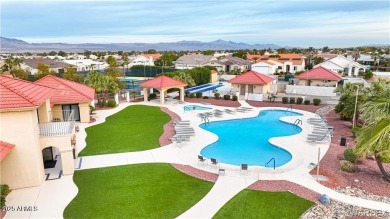 Rare 58-foot-wide waterfront lot on the middle lake in the on Los Lagos Golf Club in Arizona - for sale on GolfHomes.com, golf home, golf lot