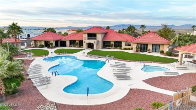 Rare 58-foot-wide waterfront lot on the middle lake in the on Los Lagos Golf Club in Arizona - for sale on GolfHomes.com, golf home, golf lot