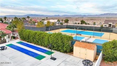 Rare 58-foot-wide waterfront lot on the middle lake in the on Los Lagos Golf Club in Arizona - for sale on GolfHomes.com, golf home, golf lot