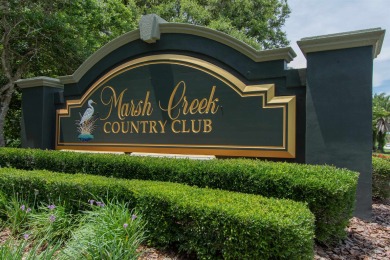 Discover refined living in this 3-bedroom, 3-bath home with a on Marsh Valley Country Club in Florida - for sale on GolfHomes.com, golf home, golf lot