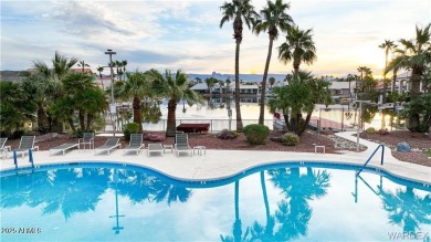 Rare 58-foot-wide waterfront lot on the middle lake in the on Los Lagos Golf Club in Arizona - for sale on GolfHomes.com, golf home, golf lot