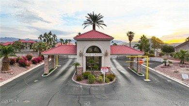 Rare 58-foot-wide waterfront lot on the middle lake in the on Los Lagos Golf Club in Arizona - for sale on GolfHomes.com, golf home, golf lot