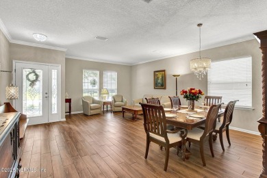 Wonderfully maintained 4 bedroom, 2 & 1/2 bathroom home situated on St. Johns Golf and Country Club in Florida - for sale on GolfHomes.com, golf home, golf lot
