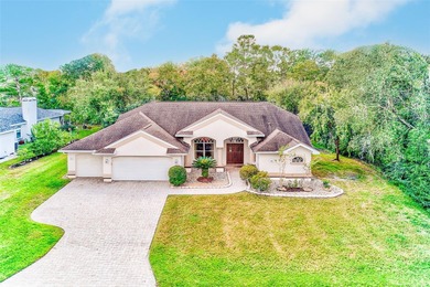 SIEZE THE OPPORTUNITY OF LIVING IN THE COZY & TRANQUIL OAK on Sugarmill Woods Golf and Country Club in Florida - for sale on GolfHomes.com, golf home, golf lot