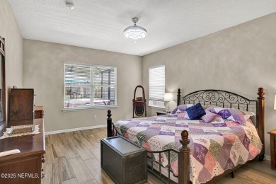 Wonderfully maintained 4 bedroom, 2 & 1/2 bathroom home situated on St. Johns Golf and Country Club in Florida - for sale on GolfHomes.com, golf home, golf lot