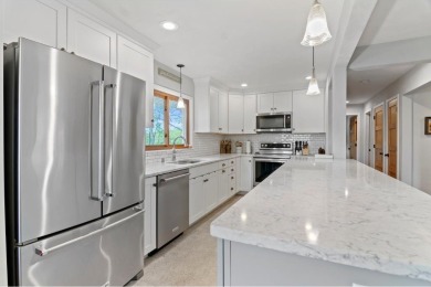Welcome to your own slice of paradise on Lake Koshkonong! This on Koshkonong Mounds Country Club in Wisconsin - for sale on GolfHomes.com, golf home, golf lot
