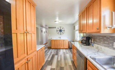 Beautifully updated 3 bedroom, 2.5 bath home offering both on Quincy Golf Course in Michigan - for sale on GolfHomes.com, golf home, golf lot