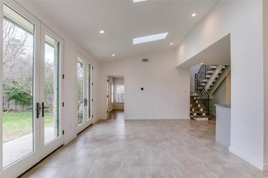 On a storybook, tree-lined lane in coveted Stevens Park Estates on Stevens Park Golf Course in Texas - for sale on GolfHomes.com, golf home, golf lot