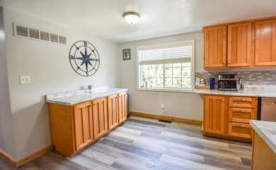 Beautifully updated 3 bedroom, 2.5 bath home offering both on Quincy Golf Course in Michigan - for sale on GolfHomes.com, golf home, golf lot