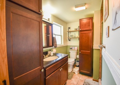 Beautifully updated 3 bedroom, 2.5 bath home offering both on Quincy Golf Course in Michigan - for sale on GolfHomes.com, golf home, golf lot
