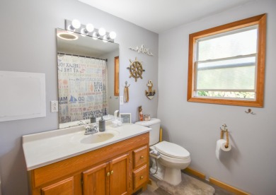 Beautifully updated 3 bedroom, 2.5 bath home offering both on Quincy Golf Course in Michigan - for sale on GolfHomes.com, golf home, golf lot