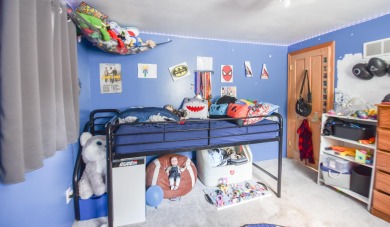 Beautifully updated 3 bedroom, 2.5 bath home offering both on Quincy Golf Course in Michigan - for sale on GolfHomes.com, golf home, golf lot