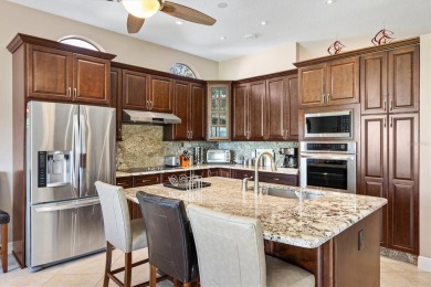 LAKEFRONT DESIGNER HOME ON SPRING-FED 'LAKE LAGUNA'! This is a on Chula Vista Executive Golf Course in Florida - for sale on GolfHomes.com, golf home, golf lot
