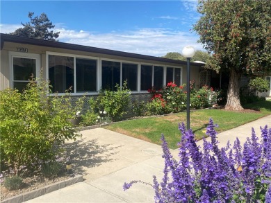 Gorgeous corner drive-up unit adorned with lovely exterior tile on Leisure World Seal Beach Golf Course in California - for sale on GolfHomes.com, golf home, golf lot