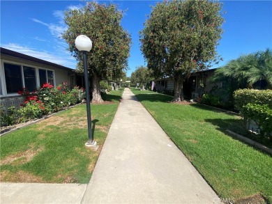 Gorgeous corner drive-up unit adorned with lovely exterior tile on Leisure World Seal Beach Golf Course in California - for sale on GolfHomes.com, golf home, golf lot