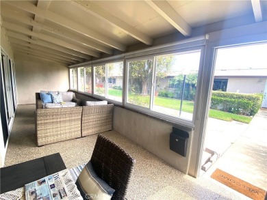 Gorgeous corner drive-up unit adorned with lovely exterior tile on Leisure World Seal Beach Golf Course in California - for sale on GolfHomes.com, golf home, golf lot