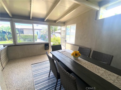 Gorgeous corner drive-up unit adorned with lovely exterior tile on Leisure World Seal Beach Golf Course in California - for sale on GolfHomes.com, golf home, golf lot