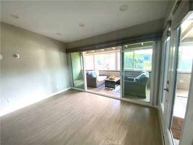 Gorgeous corner drive-up unit adorned with lovely exterior tile on Leisure World Seal Beach Golf Course in California - for sale on GolfHomes.com, golf home, golf lot