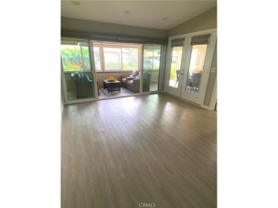 Gorgeous corner drive-up unit adorned with lovely exterior tile on Leisure World Seal Beach Golf Course in California - for sale on GolfHomes.com, golf home, golf lot