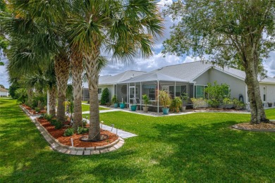 OUTSTANDING GOLF COURSE VIEW WITH GOLF CART GARAGE! This house on Ocala Palms Golf and Country Club in Florida - for sale on GolfHomes.com, golf home, golf lot