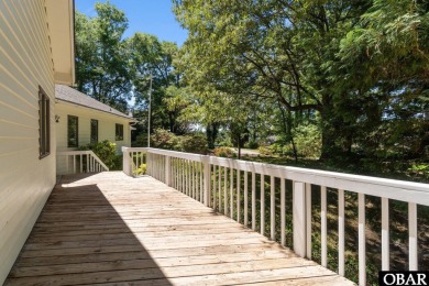 Welcome to 48 Ginguite Trail, a charming one-level ranch-style on Duck Woods Country Club in North Carolina - for sale on GolfHomes.com, golf home, golf lot