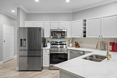 Stunning, fully upgraded ground-floor in highly sought-after on The Legacy Golf and Tennis Club in Florida - for sale on GolfHomes.com, golf home, golf lot