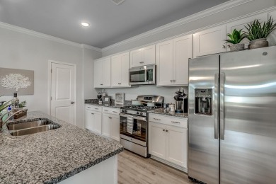 Your spacious cottage awaits in the Gwinnett C Floorplan.  This on Players Course At Wyboo Plantation in South Carolina - for sale on GolfHomes.com, golf home, golf lot